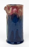 REMUED pottery cylindrical vase with applied gumnuts, branch handle and leaf, glazed in pink, blue and green, incised "Remued, Hand Made, 145/6M", 17cm high - 4