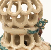 MARGUERITE MAHOOD pierced pottery candle stick with applied dragon decoration, incised "Marguerite Mahood", ​​​​​​​with later ebonised timber stand, 14.5cm high, 22cm high overall - 8