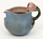 PHILIPPA JAMES pottery jug with gum blossom handle and applied leaf decoration, glazed in pink, blue and green, incised "Philippa James" 7.5cm high, 9cm wide - 2