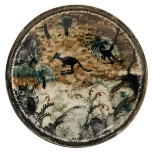 ARTHUR MERRIC BOYD and NEIL DOUGLAS pottery dish with hand-painted scene of two kangaroos in landscape adorned with grasstrees and flowers, incised "A. M. B. Neil Douglas", with Primrose Pottery Shop ink stamp, 18cm diameter