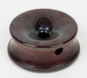 A colonial pottery spittoon with Rockingham glaze and pearled border, 6.5cm high, 16.5cm diameter