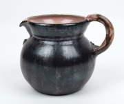 PHILIPPA JAMES brown glazed pottery jug&nbsp; with pink interior, adorned with&nbsp;gumnuts and leaf with branch handle, incised "Philippa James" ​​​​​​, 14cm high, 17.5cm wide - 2