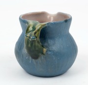 PHILIPPA JAMES pottery jug with applied gumnuts and juvenile gum leaf, glazed in blue and green with pink interior, incised "Philippa James" 7cm high, 9.5cm wide - 3