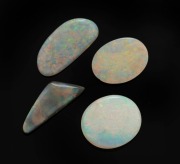 Four solid opals, both black and white, ranging from 4ct to 9ct each - 2