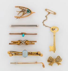 Eight antique bar brooches, comprising a key brooch by JOSEPH LAWRENCE of Melbourne, a South Australian bow brooch, a golf stick, a white opal, a wishbone and swallow plus three others, 9ct and 15ct gold as well as platinum topped example, circa 1900, ​​​