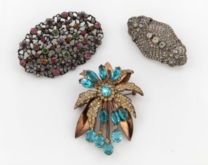 Three assorted paste brooches. One Australian by SIMPSON Pty Ltd of Sydney, one 19th century example, the other Edwardian, the largest 6cm wide