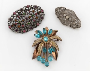 Three assorted paste brooches. One Australian by SIMPSON Pty Ltd of Sydney, one 19th century example, the other Edwardian, ​​​​​​​the largest 6cm wide