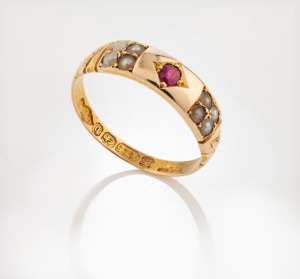 An antique 15ct yellow gold ring, set with a ruby and eight seed pearls, 19th century, 2 grams