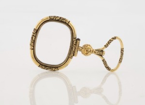 A late Georgian gold cased quizzer looking glass, circa 1835, ​​​​​​​6.5cm long
