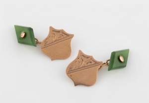 A pair of antique 9ct gold shield shaped cufflinks with nephrite backs, 19th/20th century, stamped "9ct, LLOYD"