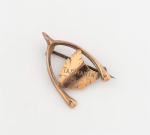 WILLIS & SONS of Melbourne antique 9ct rose gold wishbone and Tasmanian map brooch, circa 1900, stamped "9.W." with unicorn mark, ​​​​​​​3cm wide, 1.3 grams