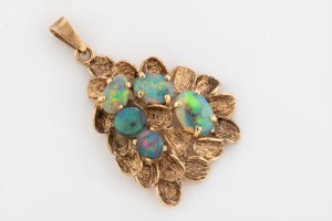 A vintage 9ct yellow gold pendant, set with five polished opals, circa 1970s, stamped "9ct", 4.5cm high overall, 5.5 grams