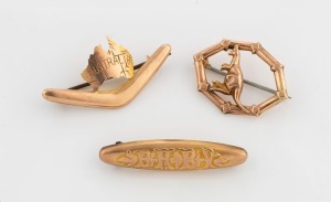 Three antique Australian 9ct gold brooches, comprising a kangaroo, a boomerang and Australian map, and a "BABY" brooch, 19th/20th century, ​​​​​​​the largest 3.9cm wide, 4.4 grams total