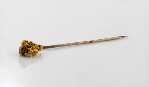 A gold miner's stickpin with gold nugget specimen, 19th century, 6.5cm high, 3.3 grams total including pin