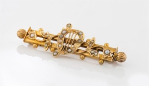 An antique Australian 15ct yellow gold harp and flowers brooch, adorned with seed pearls, 19th century, 5.5cm wide, ​​​​​​​5.7 grams