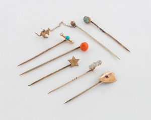 STICK PINS, group of seven antique gold examples including kangaroo, polished solid opal, coral, and diamonds, 19th/20th century, ​​​​​​​8.3 grams total