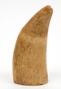 An antique whale's tooth ornament with cut down base, 19th century, ​​​​​​​13cm high