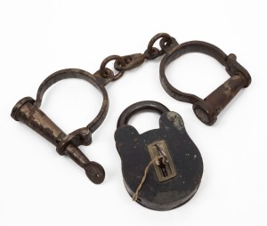 Antique padlock and key, together with a set of handcuffs with key, 20th century, (2 items)