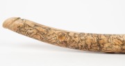 OOSIK (walrus penis) carved as a phallus and engraved with erotic scenes titled "Taming of the Shrew" and "Much Ado About Nothing", 41.5cm long - 5