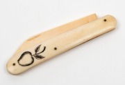 A scrimshaw whalebone busk with engraved decoration, a whalebone pocketknife engraved with an apple and a whale's tooth carved with rose decoration, (3 items), the busk 15cm long - 5