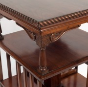 An Australian solid cedar ex-revolving set of bookshelves with gadrooned perimeter top, conforming plinth base, three tiers, turned pillars and carved brackets, 19th century, Note: Hoist post missing. 95.5cm high, 53cm wide, 53cm deep - 2