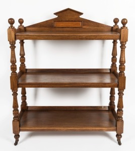 An antique Australian solid blackwood dumb waiter with Palladian panelled rail back, three tiers, incised bulbous pillars and ball finials, circa 1890, 131.5cm high, 105.5cm wide, 44cm deep