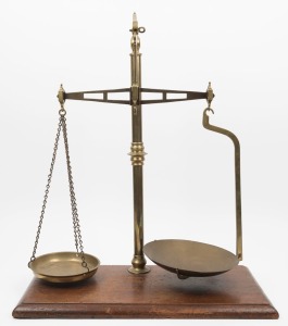 Antique balance scales on mahogany base, 19th century, 66cm high, 56cm wide