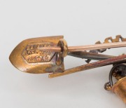 "COOLGARDIE" 15ct gold brooch with crossed pick and shovel, bucket and gold nugget specimen, applied lozenge mark ​​​​​​​stamped 15ct with pictorial marks, ​​​​​​​4.4cm wide - 2