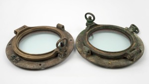 Two vintage cast brass ship's portholes, 20th century, 32cm wide