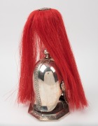 A presentation electro plated silver model of a Calvary helmet of The royal Horse Guards, the helmet with leather backed chain scales and enameled garter below a red plume, circa 1900, 33cm high - 2