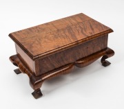 An Australian fiddleback&nbsp;blackwood jewellery casket with cabriole legs, finely crafted with choice cuts of timber, early 20th century, 15cm high, 31cm wide, 18cm deep