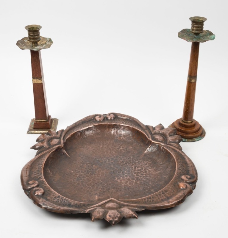 Australian Art & Crafts copper tray and two silky oak, mountain ash and brass candlesticks, early 20th century, (3 items), ​​​​​​​the tray 39cm wide