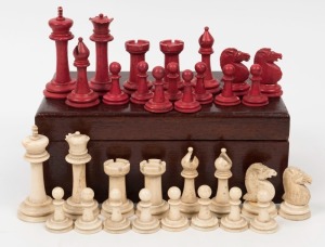 A carved whalebone chess set, housed in an Australian cedar box, 19th century, 8cm high, 3cm diameter