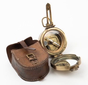 WW2 field compass with original leather pouch, stamped with broad arrow mark and "STANLEY, LONDON, 1942", 11.5cm high overall