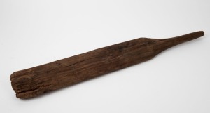 An Australian antique folk art cricket bat fashioned from a single piece of eucalyptus, 19th century, 75cm high