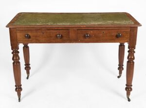 An antique Australian cedar lady's desk with two drawers and original embossed and tool green leather top, Sydney origin, 19th century, 78cm high, 123cm wide, 61cm deep