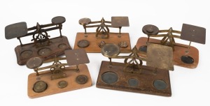 Five antique postal scales with assorted brass weights, 19th/20th century, ​​​​​​​the largest 21cm wide