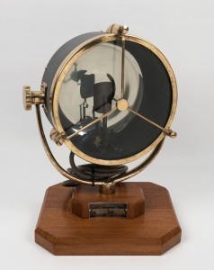 Nautical searchlight lamp, circa 1940s, on later silky oak platform base, ​​​​​​​45cm high