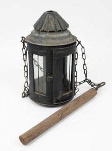 An antique metal hanging lantern, on chains with wooden carrying handle, 19th century, the lantern 34cm high