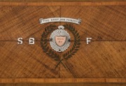 An antique Australian specimen timber marquetry serving tray with metal gallery, presented as a prize with sterling silver and rose gold plaques "THE BEST AND FAIREST, WON BY S.B.F." (South Brisbane Football Club?), Queensland origin, early 20th century, - 2