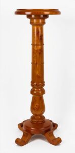 An Australian solid huon pine pedestal with circular top, conforming base, ring-turned bulbous trunk and four scrolled feet, late 19th century, 84.5cm high, 28.5cm diameter