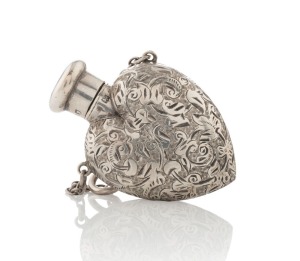 An antique English sterling silver heart shaped scent bottle with engraved decoration, by Sampson Mordan & Co. of London, circa 1896, 4.5cm high