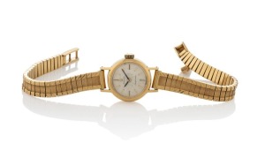 OMEGA ladies vintage wristwatch in 18ct gold case with 18ct gold Omega bracelet, stamped "750",