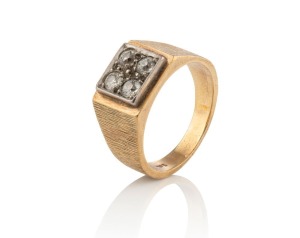 A 9ct white gold ring, set with four brilliant cut white diamonds in square white gold mounts, stamped "9ct", 8 grams total