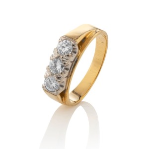 An 18ct yellow gold ring, set with a row of three brilliant cut fine white diamonds (approx. 1.0ct total), mounted in platinum, stamped "18ct, PALL." 5.4 grams