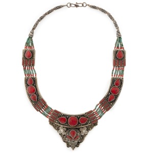 A tribal silver necklace, set with turquoise, trade beads and red stones, an exceptional quality example, 50cm long