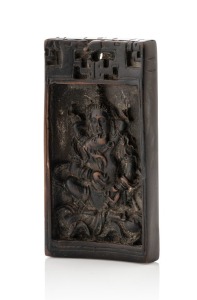 An antique Tibetan carved wooden amulet, 19th/20th century, ​​​​​​​6.3cm high