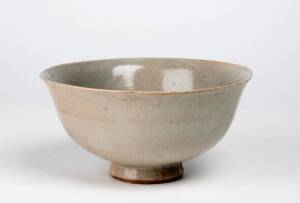 A Chinese Shufu bowl, Yuan Dynasty 1280-1368, with moulded design in the centre. 18cm high