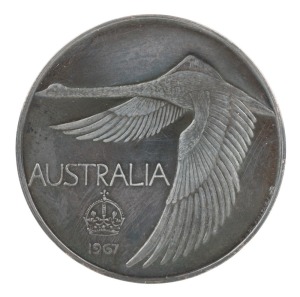ELIZABETH II, unoifficial pattern silver swan dollar, 1967, by Andor Meszaros, plain edge. In maroon case of issue, with iridescent dark grey tone, FDC.