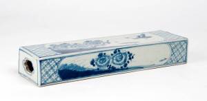 An unusual Chinese blue and white rectangular pillow with flat unglazed base, late Qing/Republic Period, 19th/20th century. 30cm wide, 4.8cm high, 8.5cm deep